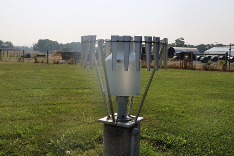 A rain gauge stands under s dry sky at a weather station on the WKU Farm June 8. The gauges are one of the main tools used to track weather patterns through the Kentucky Mesonet. 