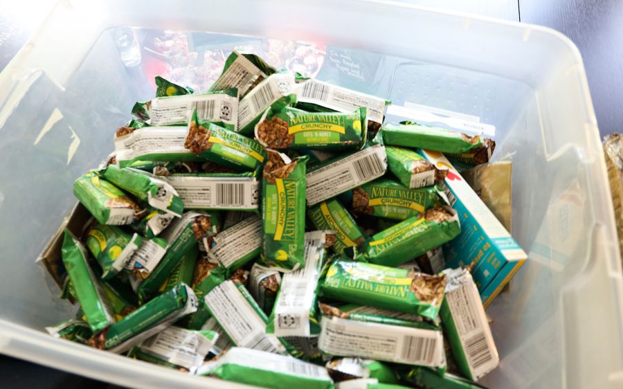 Granola bars lay in an open box inside the WKU Food Pantry. The food pantry is open by appointment during the summer.